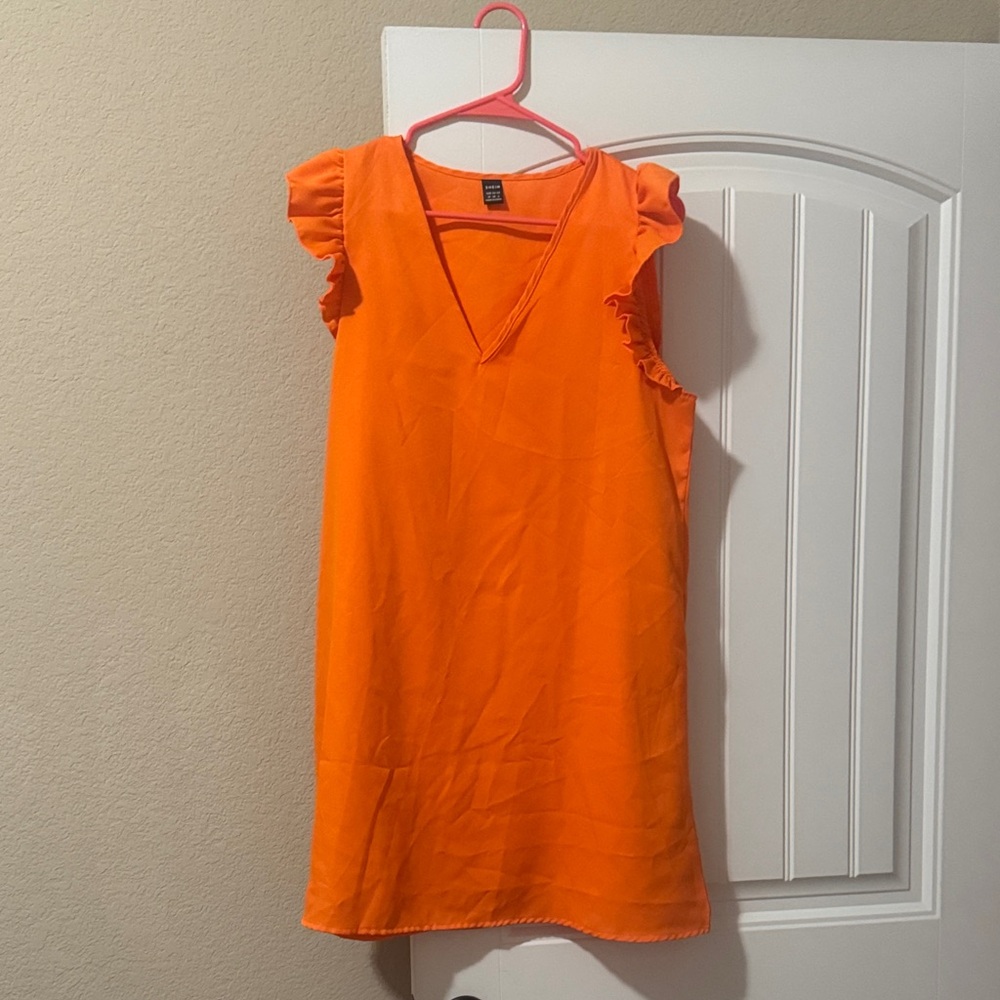 Orange ruffled sleeve dress